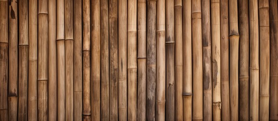 A detailed shot showcasing a patterned bamboo wall with a rich brown wood stain. The natural beauty of the hardwood planks alongside the metal fastenings creates a stunning visual