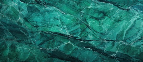 A close up of a green marble texture resembling a pattern of terrestrial plant veins, with electric...