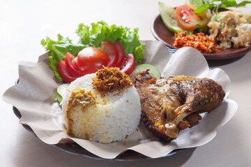 Lalapan Ayam Penyet or Vegetable smashed chicken