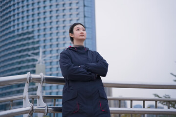 Confident Businesswoman Overlooking the Cityscape