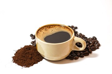 Espresso coffee in the glass put on white background with isolated picture style. Coffee beans spread around the glass.