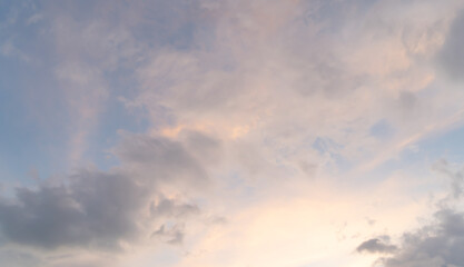 Sunset sky. Abstract nature background. Dramatic blue with orange colorful clouds in twilight time.