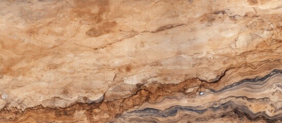 A close up of a bedrock outcrop with a marble texture, featuring a beige and brown pattern resembling hardwood flooring. The landscape showcases the natural beauty of the rock wall