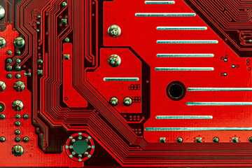 back side of red PCB. electrical connections of circuit board. details extreme closeup.