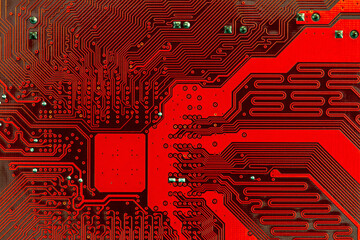 electrical connections of red computer mother board. details closeup. technology background.