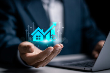 Real estate investment concept. Businessman using laptop to analyzing mortgage loan home and...
