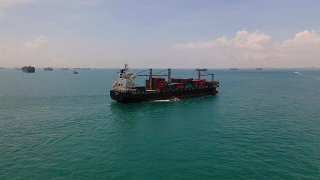 Aerial shot of container ship sailing, Singapore Straits, Singapore