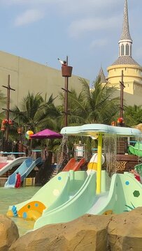 Aqua Park Palm trees roller coaster rides games Water park slides palm trees slides attractions recreation for children and adults great time Vinpearl, VinWonders Nam Hoi An, Quang Nam