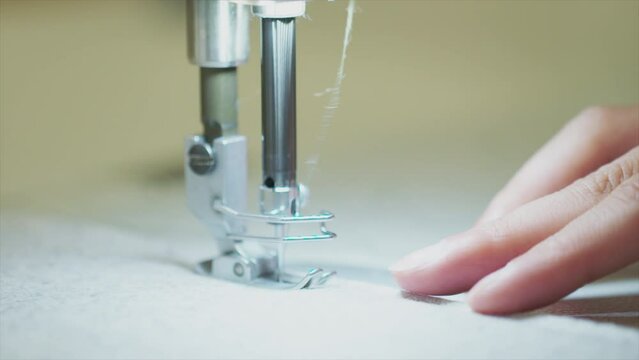 Sewing machine needle in slow motion