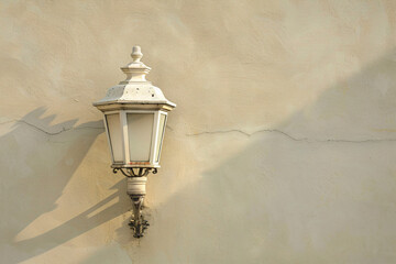 a white light on a wall with a shadow