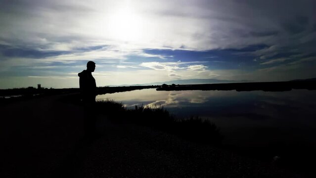 Man Silhouette near the River