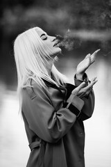 Portrait of a young beautiful blonde girl outdoors.