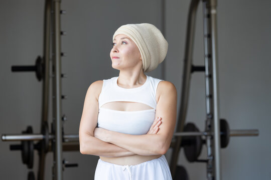 Healthy and fit woman getting well after cancer treatment, concept image of cancer medical care, overcoming cancer sickness, alternative tumor medical treatment