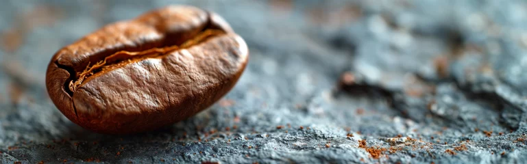 Tuinposter Close-up of a single, roasted brown coffee bean, the source of our favorite morning beverage © Coffee Cafe Lover