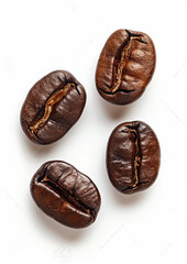 Close-up of roasted brown coffee beans scattered on a white background