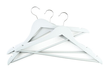 Grey wooden hangers isolated on white background