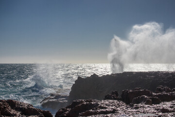 Experience the mesmerizing Point Quobba Blowholes in WA! Witness nature's spectacle as waves crash into coastal caves, creating powerful sprays and booming echoes