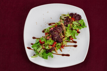 Vegetable salad on a plate, menu for a restaurant