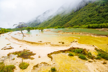 The beautiful scenery of Huanglong Yaochi in rainy season in Sichuan, China