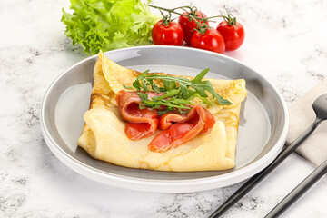 Russian pancake with salmon fish