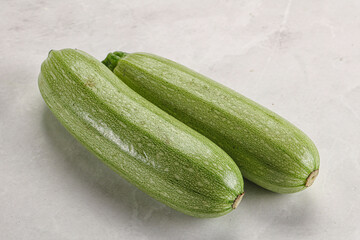 Raw green ripe zucchini vegetable