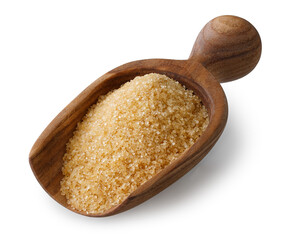 brown cane sugar in wooden scoop