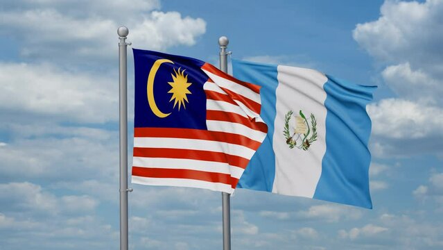 Guatemala and Malaysia two flags waving together, looped video, two country relations concept