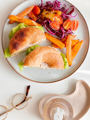  Tuna Bagel with mixed salads for breakfast. Morning time. Fresh meal.Delicious food. Cooking recipes. Brunch. Healthy recipe. American bagel breakfast.