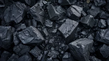 Poster Pile of coal. Black coal texture background. Top view. © LAYHONG
