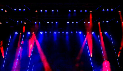 Blue stage lights. Illumination with spotlights at a concert