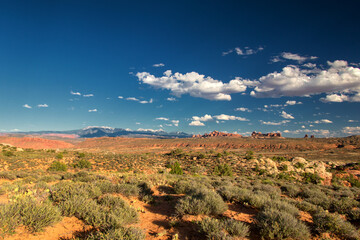 Arches National Park near Moab, Utah, USA, boasts stunning red rock formations, iconic arches,...
