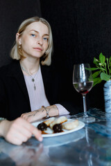 woman with a glass of wine