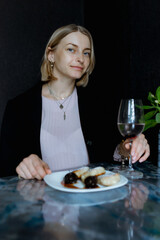 woman with a glass of wine