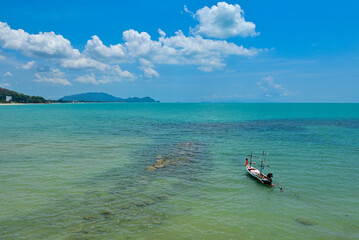 Long tail boat in the sea, Beautiful sea clear water, relaxing in your holiday at Khanom beach...