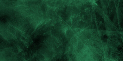 Dark green painted smoky textured dark green color powder explosion. Steam explosion green smoke or Abstract dark and green smokey aquarelle paint paper textured canvas for design. Light and soft.