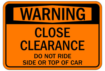 Railroad safety sign close clearance. Do not ride side or top of car