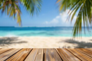Wooden table with blurred bokeh light seascape and palm leaves at tropical beach background - obrazy, fototapety, plakaty