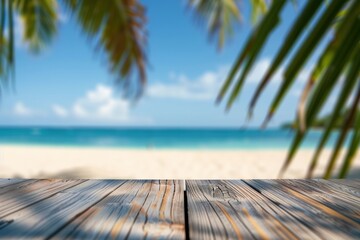 Wooden table with blurred bokeh light seascape and palm leaves at tropical beach background