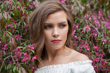 Naklejka premium Sweet spring woman enjoying nature outdoor, fashion beauty portrait