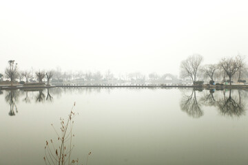 Naklejka na ściany i meble a foggy lake in Xuzhou, China