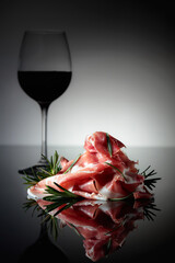 Italian prosciutto or Spanish jamon with rosemary and red wine.