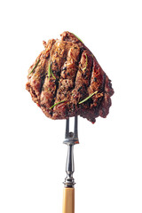 Grilled beef steak with rosemary isolated on a white background.