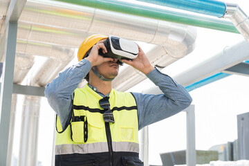 Male engineer using virtual reality headset inspecting quality of water pipes system at rooftop of...