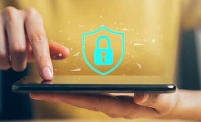 Woman holding smartphone and showing padlock, protecting data on internet technology networking GDPR(general data protection regulation).