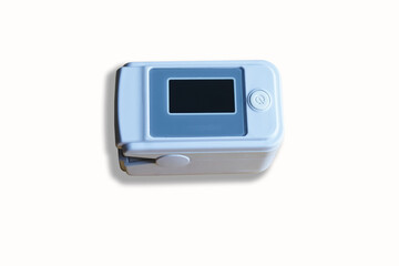 An oximeter is used to measure the pulse rate and oxygen level in the body through the finger.