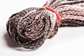 Womens de braids, dreadlocks, with braided pigtails.