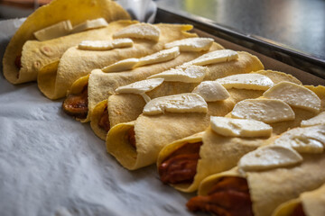 Homemade mexican enchiladas on baking oven tray