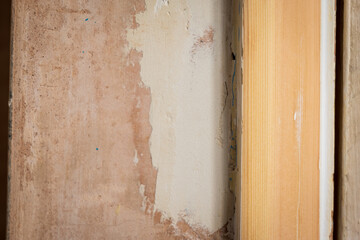 sanded wooden door casing closeup during home renovation