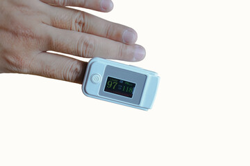 An oximeter is used to measure the pulse rate and oxygen level in the body through the finger.