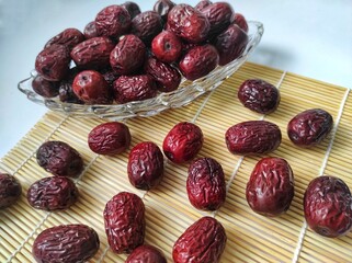 Dried grand jujube red dates, isolated on background.